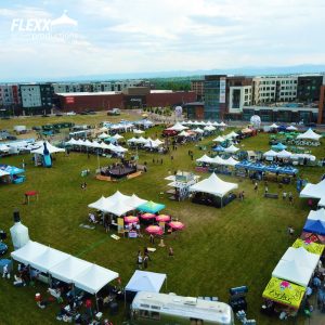 Outdoor food festival with numerous pole tents and canopy tent rentals