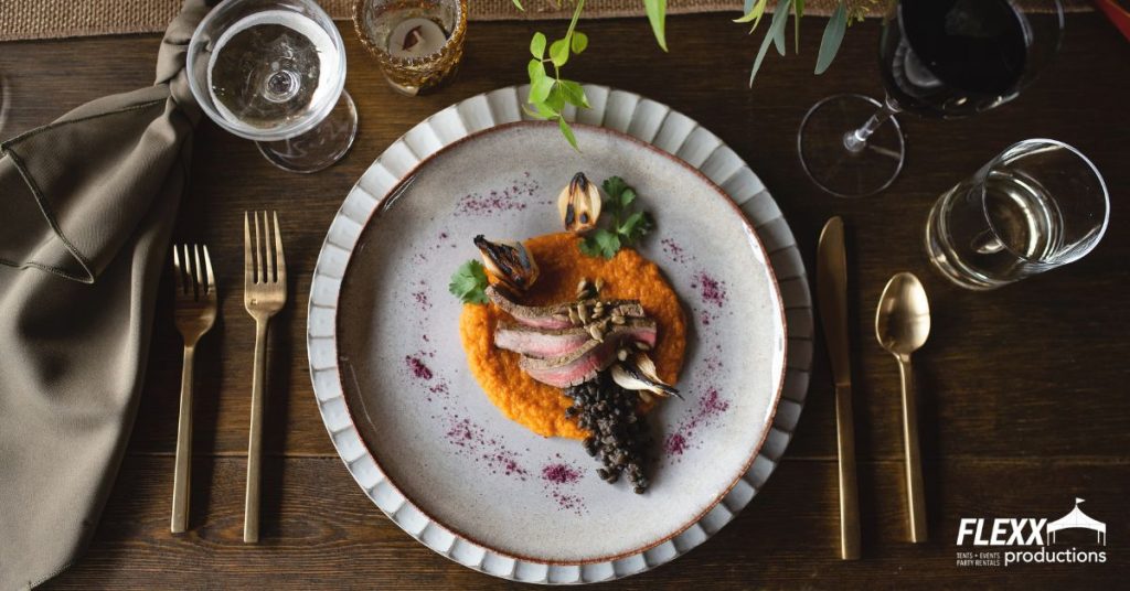 Table set with china, glassware, flatware, and more to illustrate FLEXX's host with the most holiday bundle