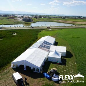 40x cleartop clearspan structure tent set up for a lakeside wedding