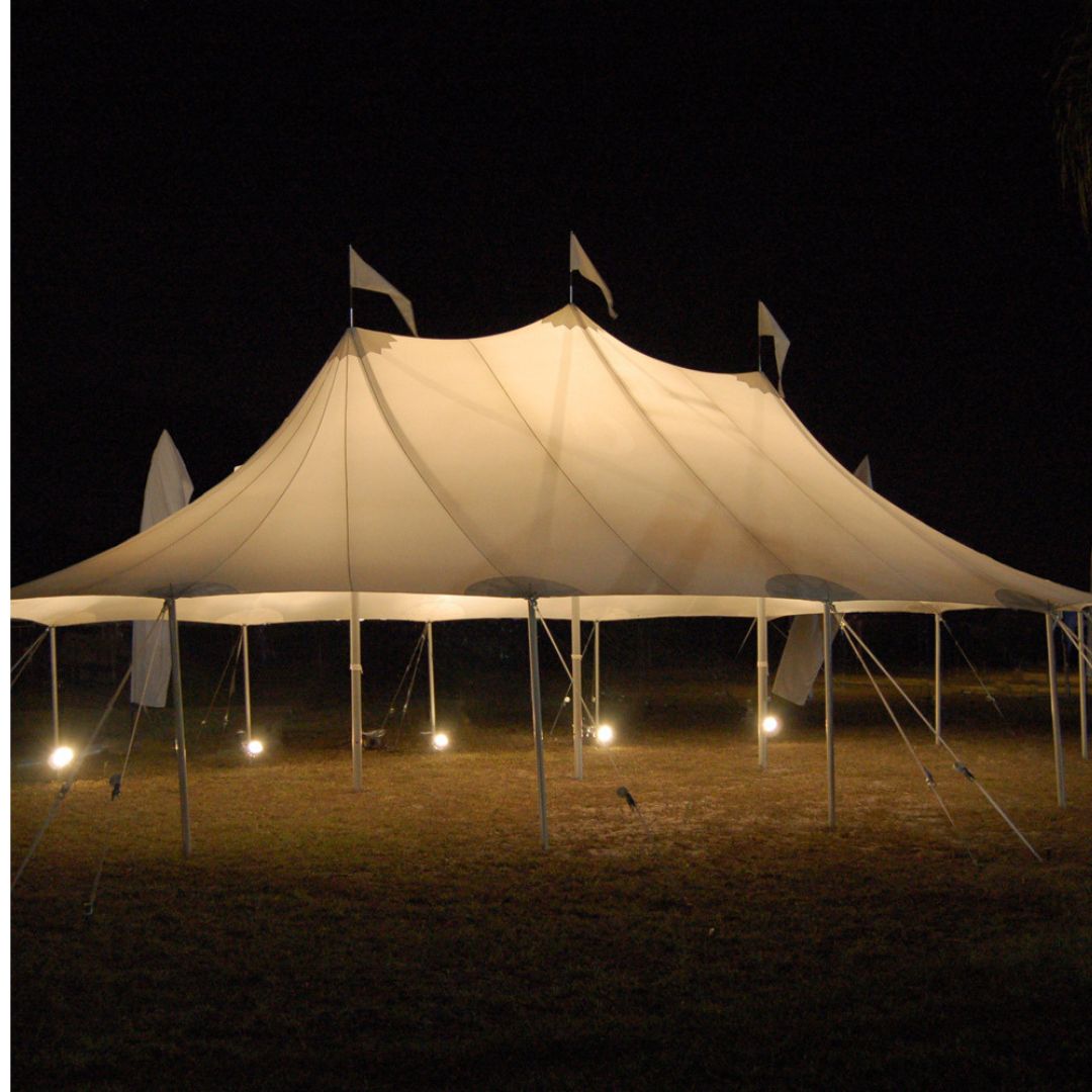 professional-tent-and-equipment-installations Large tidewater tent lit up for a nighttime wedding