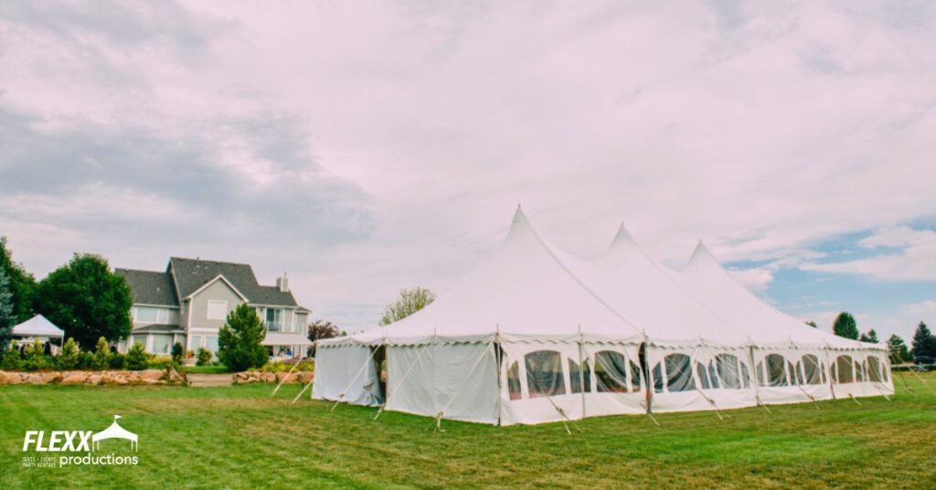 Large Tidewater tent set up for a backyard event
