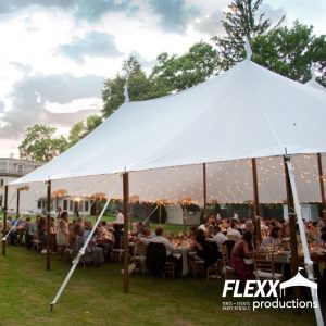Market string lighting elements on a tidewater wedding tent