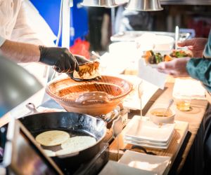 Catering and serving rentals set up for an event