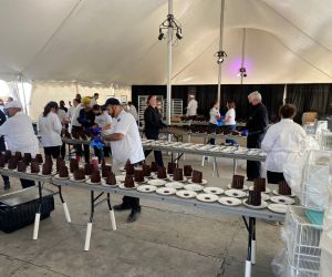 Kitchen equipment and other event rentals set up for a festival