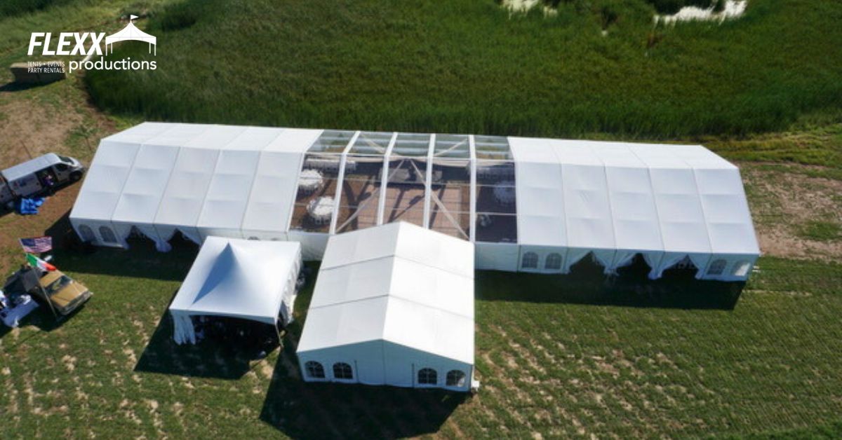 A large Clearspan tent from FLEXX Productions set up for an event