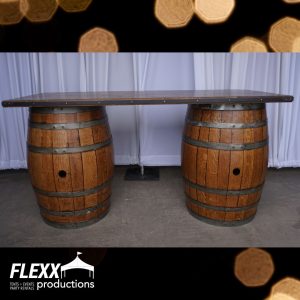 Serving bar on wine barrels and other party rentals for company parties