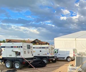 Power generators set up to power kitchen equipment at an event