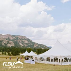 Large Tidewater tent rental and two smaller frame tents set up for a mountainside wedding
