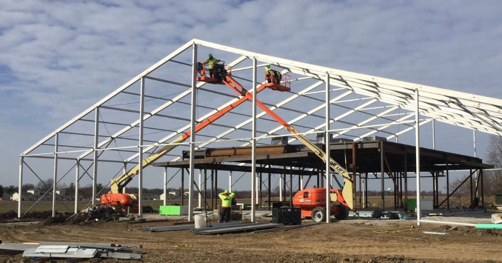 Temporary tent structure being built