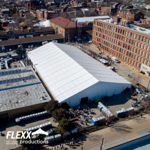 Aerial view of a large temporary structure tent in a downtown