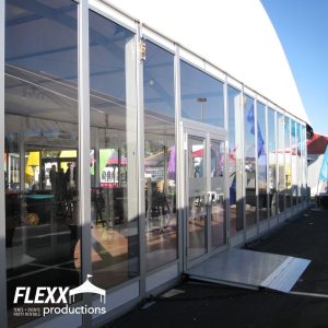 Exterior view of the glass walls of a temporary structure